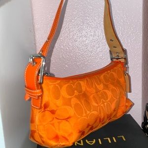 Orange Coach purse